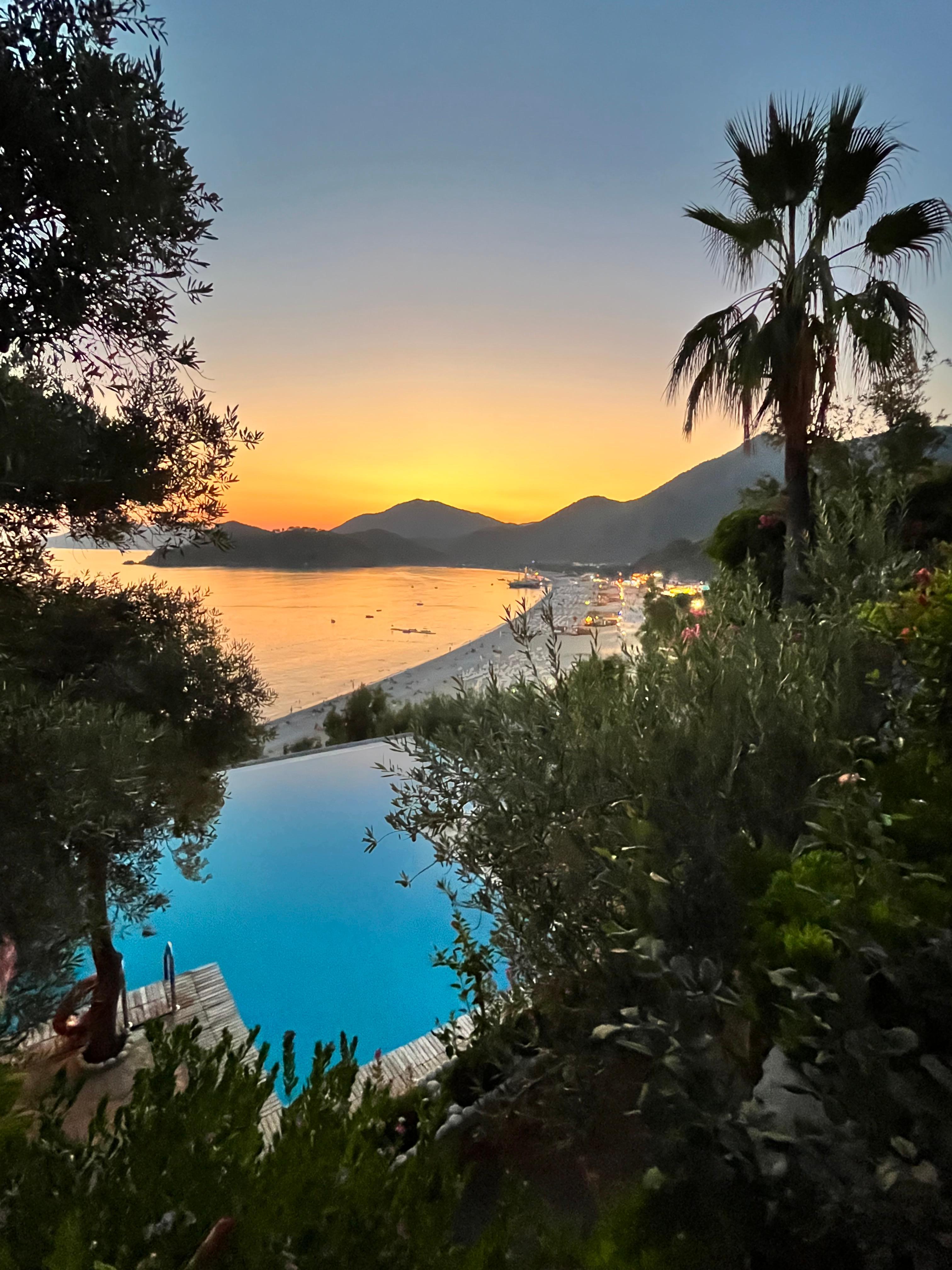 Sunset view from above the pool, across the bay. Just stunning!