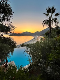 Sunset view from above the pool, across the bay. Just stunning!