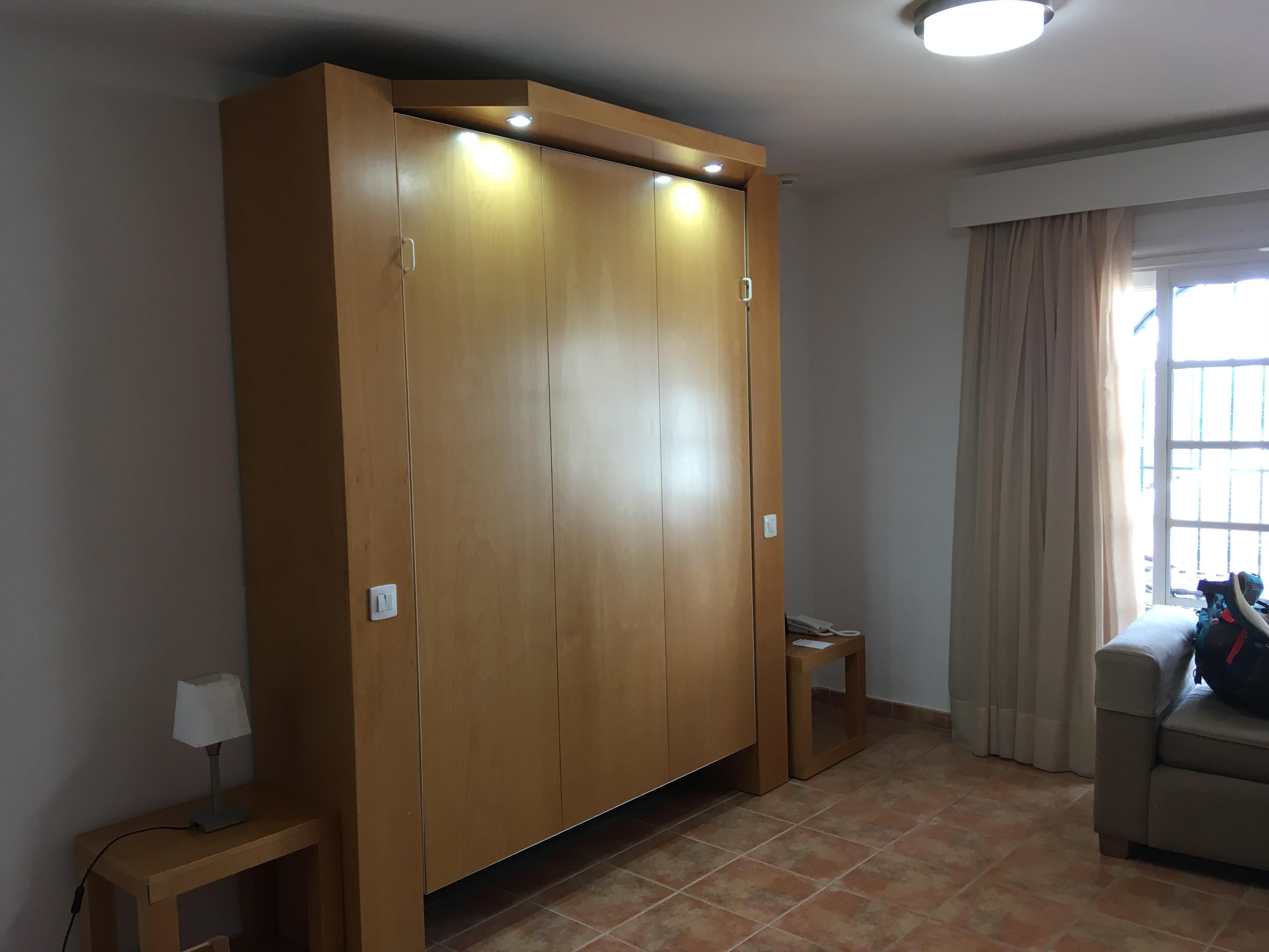 The studio with the bed inside and the sofa to be pulled away and placed inn front of the door to the terrace