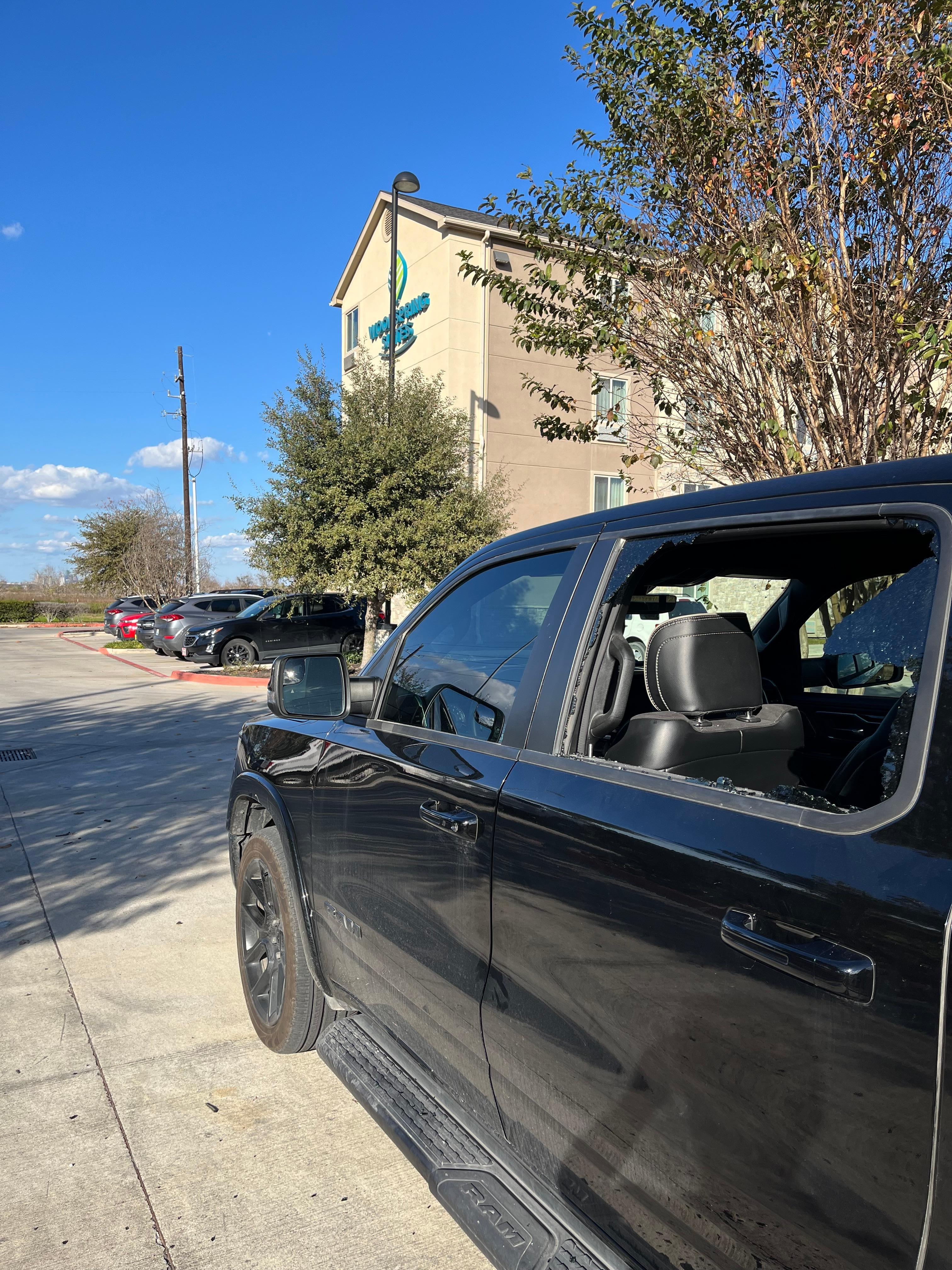Broken window. Parking lot. Happened in broad daylight 11:30 am