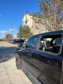 Broken window. Parking lot. Happened in broad daylight 11:30 am