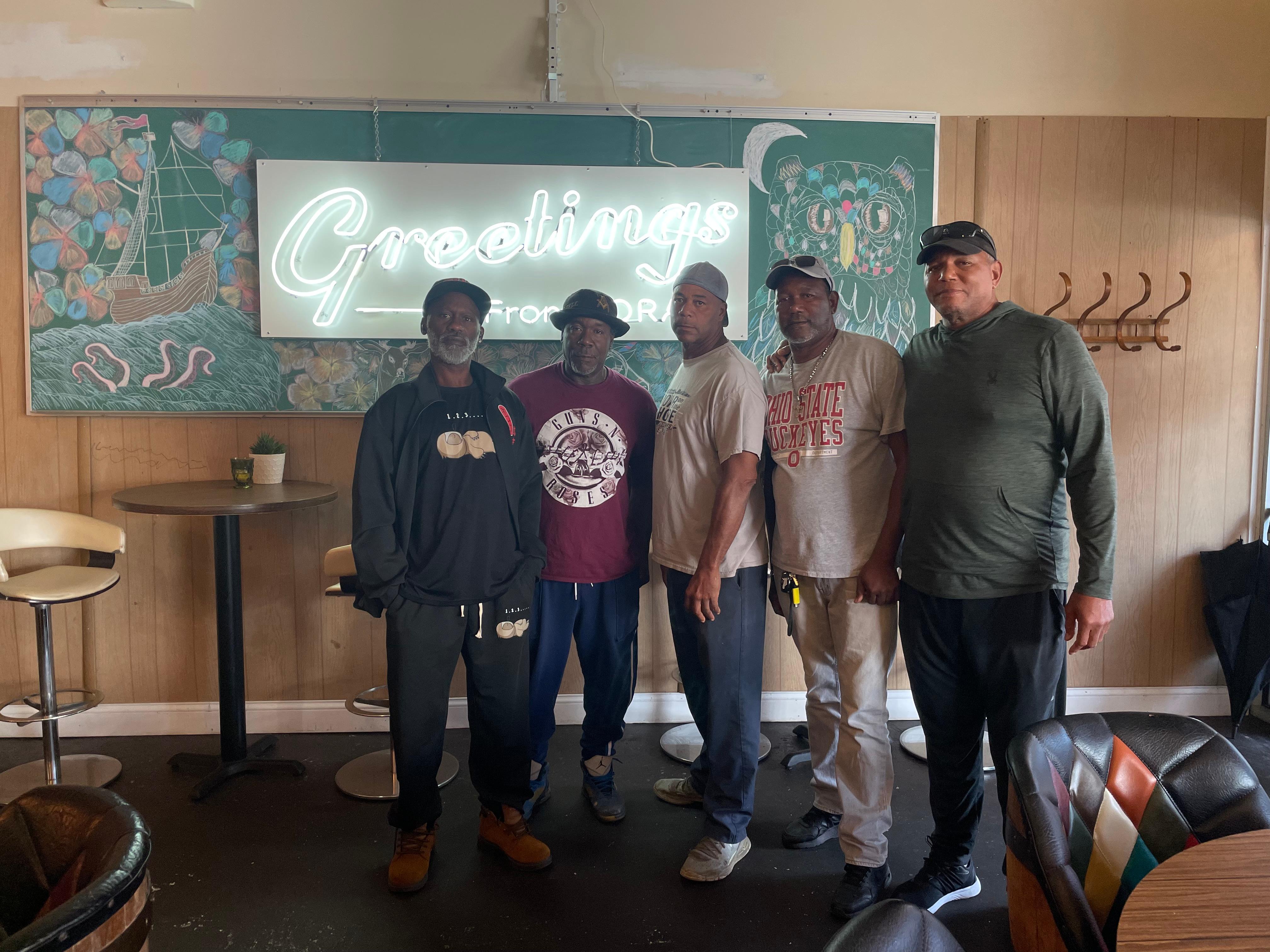 My brothers and cousin after breakfast at Broadway Mary's across from the unit!