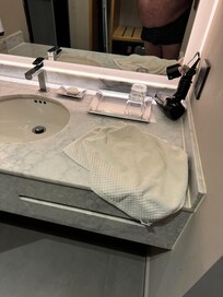 Just one hand towel, and one bath towel, no shower floor mat