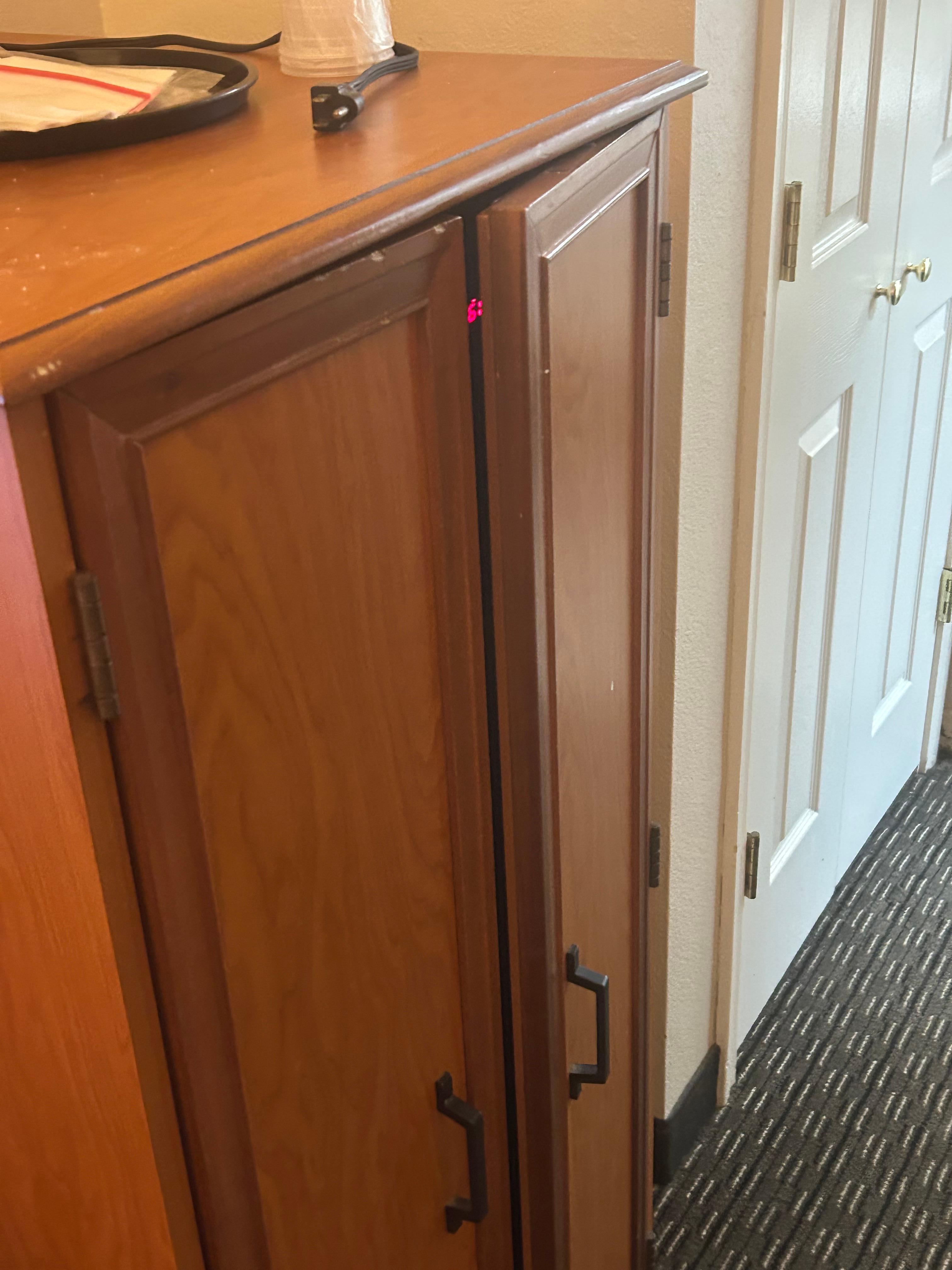 Cabinet to fridge doors don’t close and outlet don’t work to plug coffeemaker in.