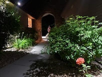 Moonrise over the entry archway.