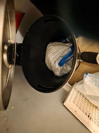 Trash from previous guest still in can