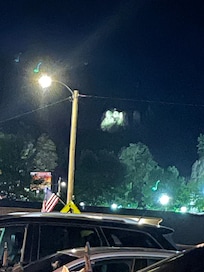 View of Mount Rushmore at night all lite up.