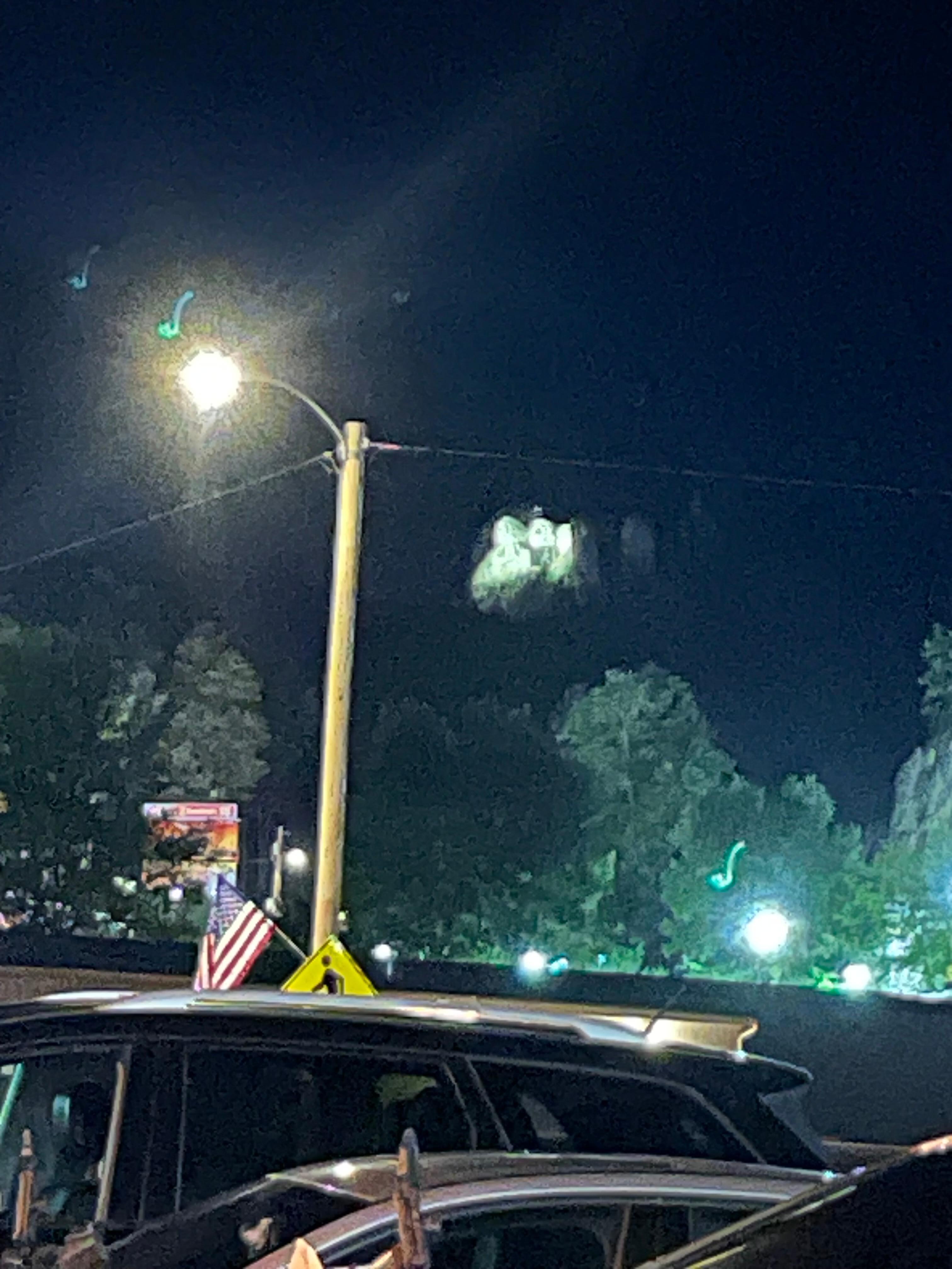 View of Mount Rushmore at night all lite up.