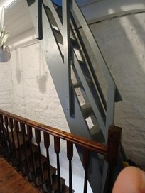 Échelle de meunier accédant à la deuxième chambre