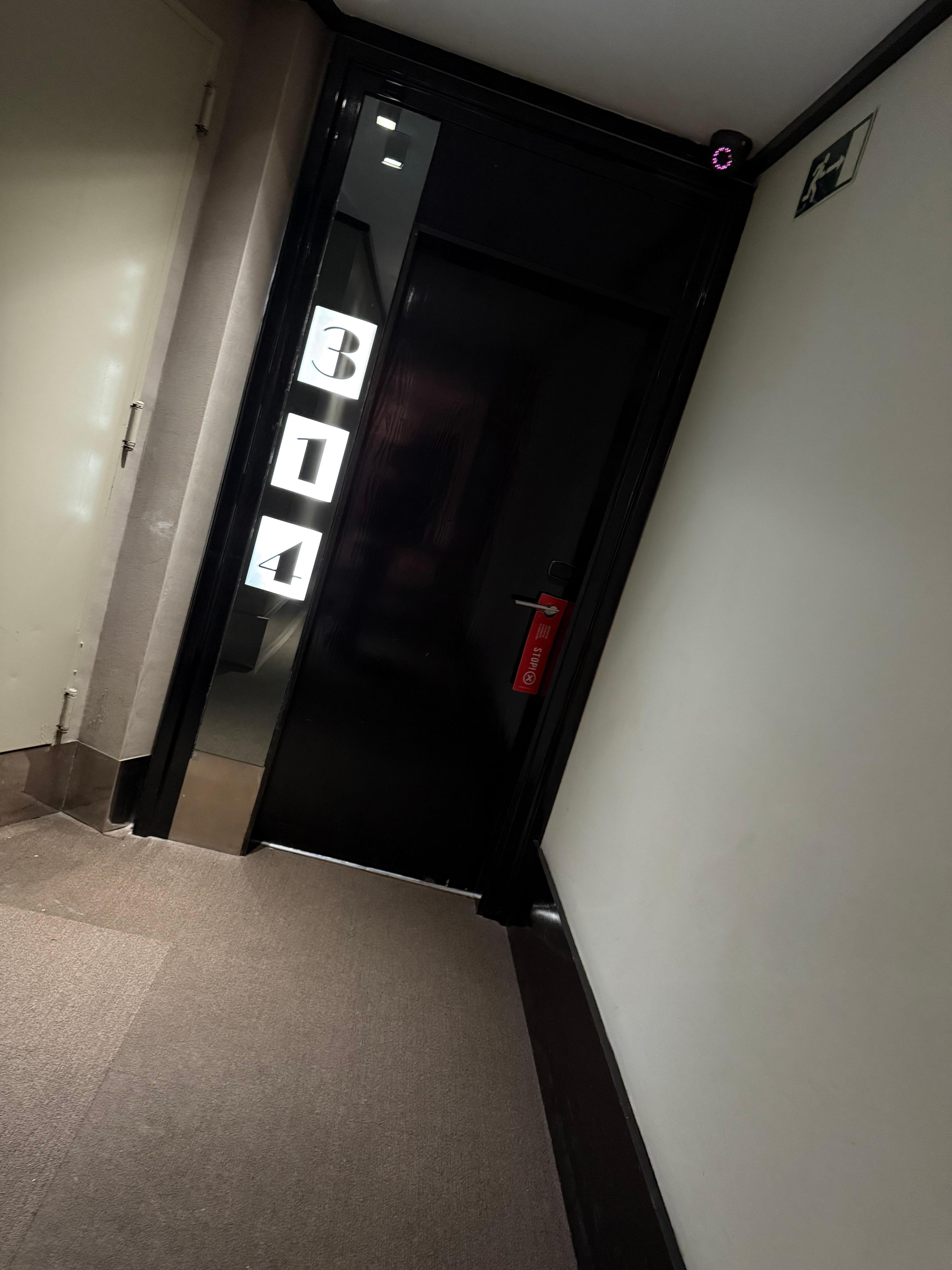 Room door. Very cool room number sign. 
