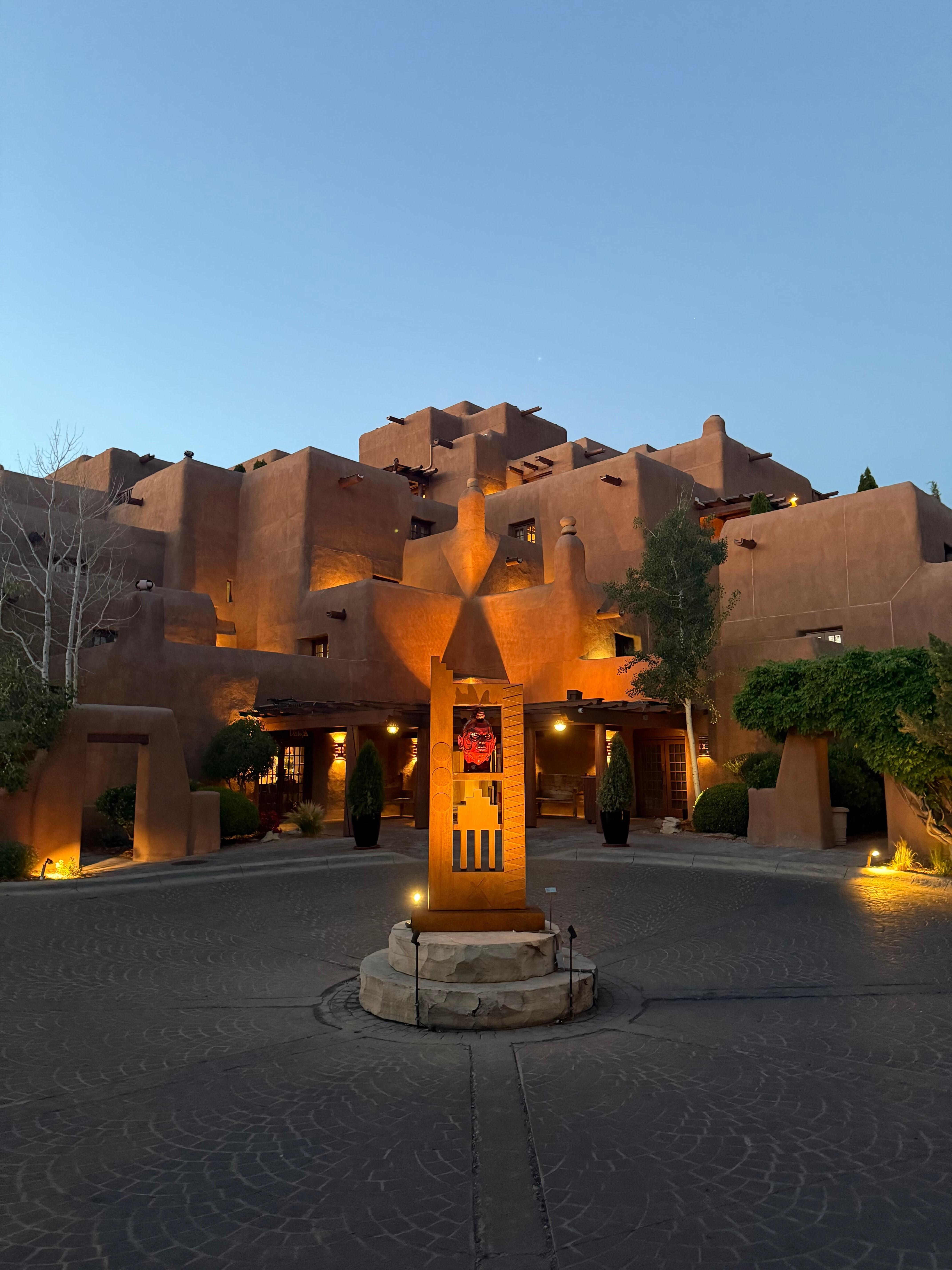 Front of hotel at sunset. 
