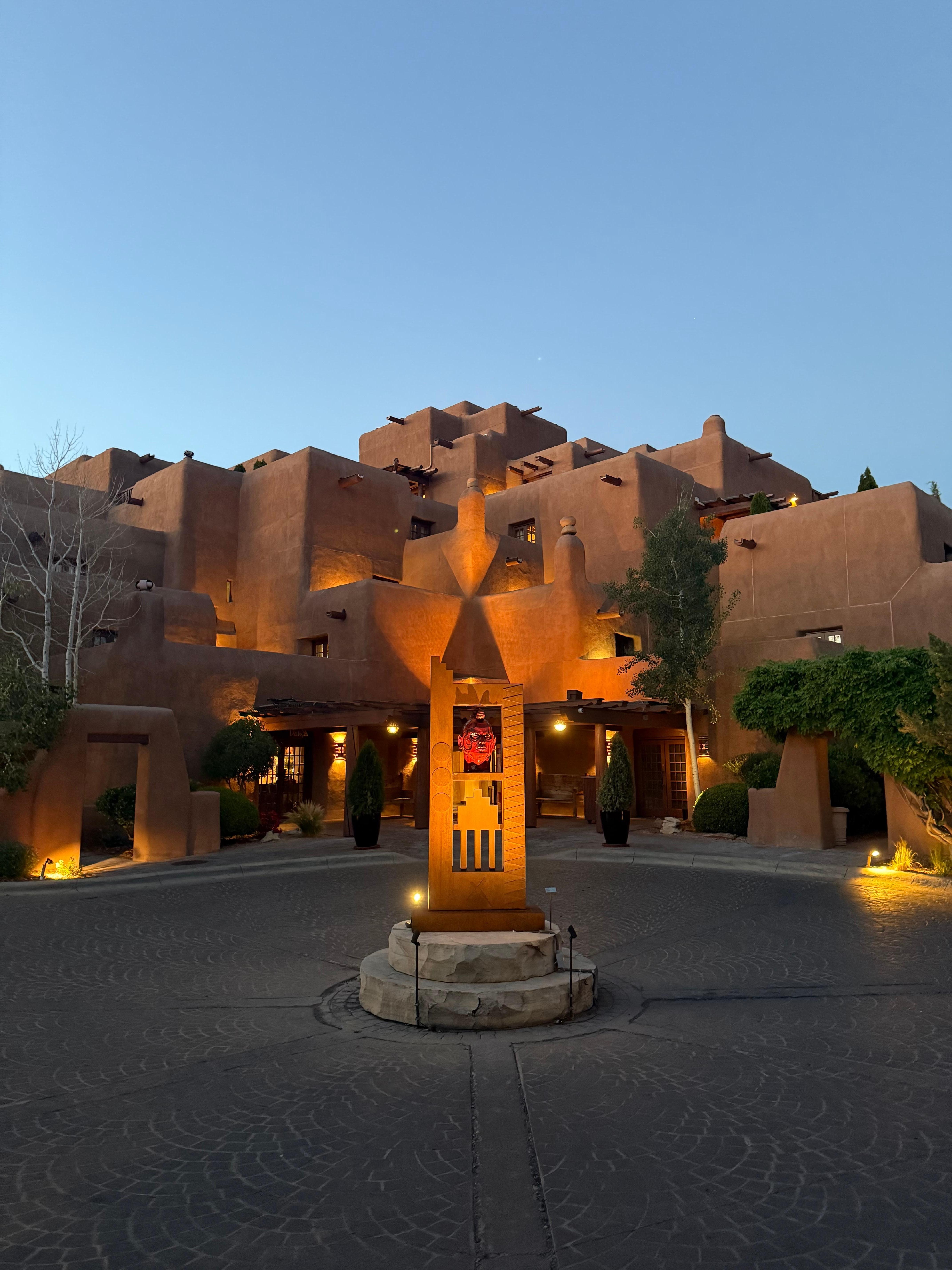 Front of hotel at sunset.