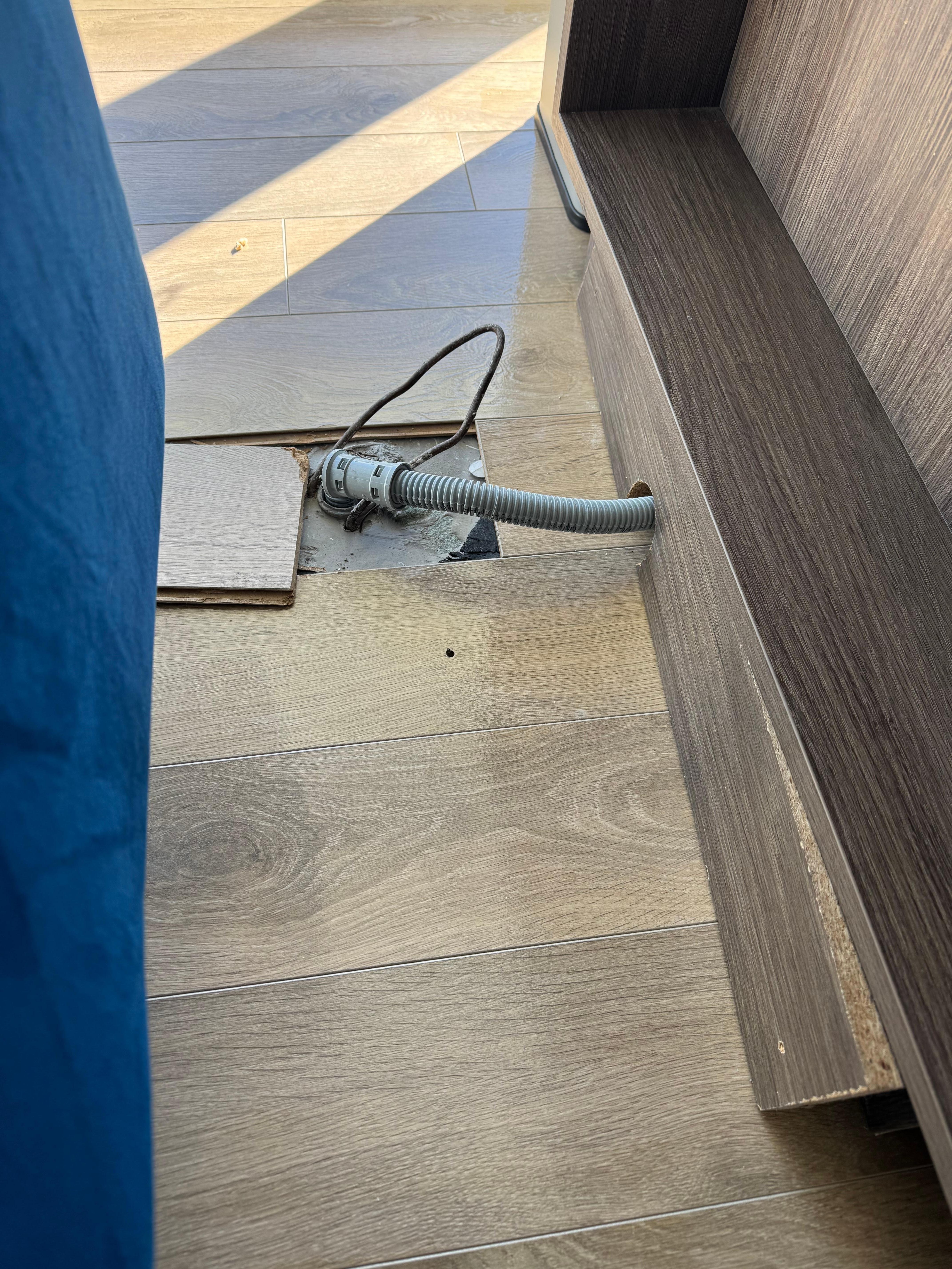 Kitchen floor should be refinished to avoid exposed cords.