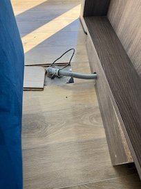 Kitchen floor should be refinished to avoid exposed cords.