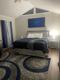 Master bedroom has doors to deck.