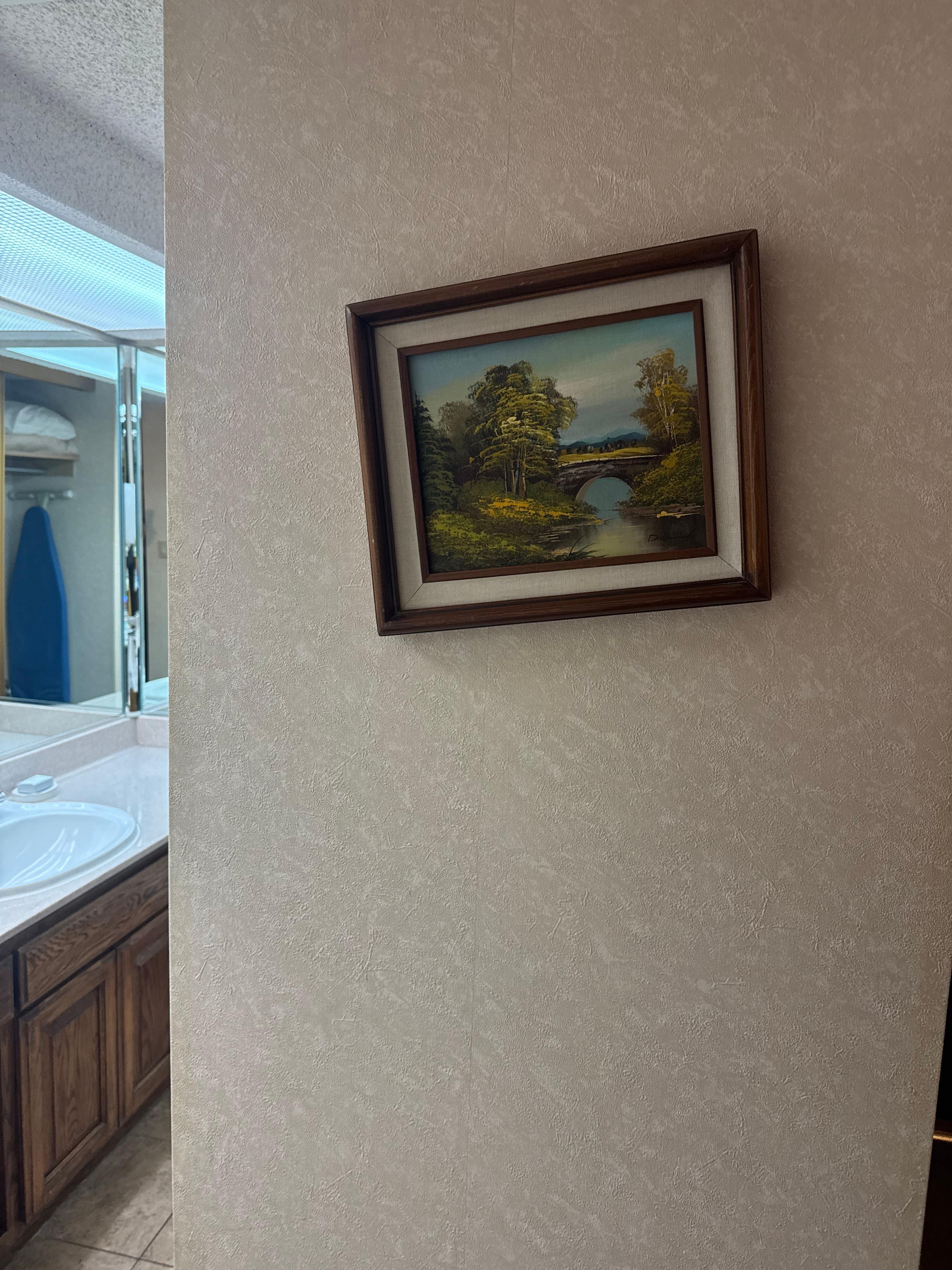 The whole room was tilting, the only picture I could find was one of the picture I had fixed several times.