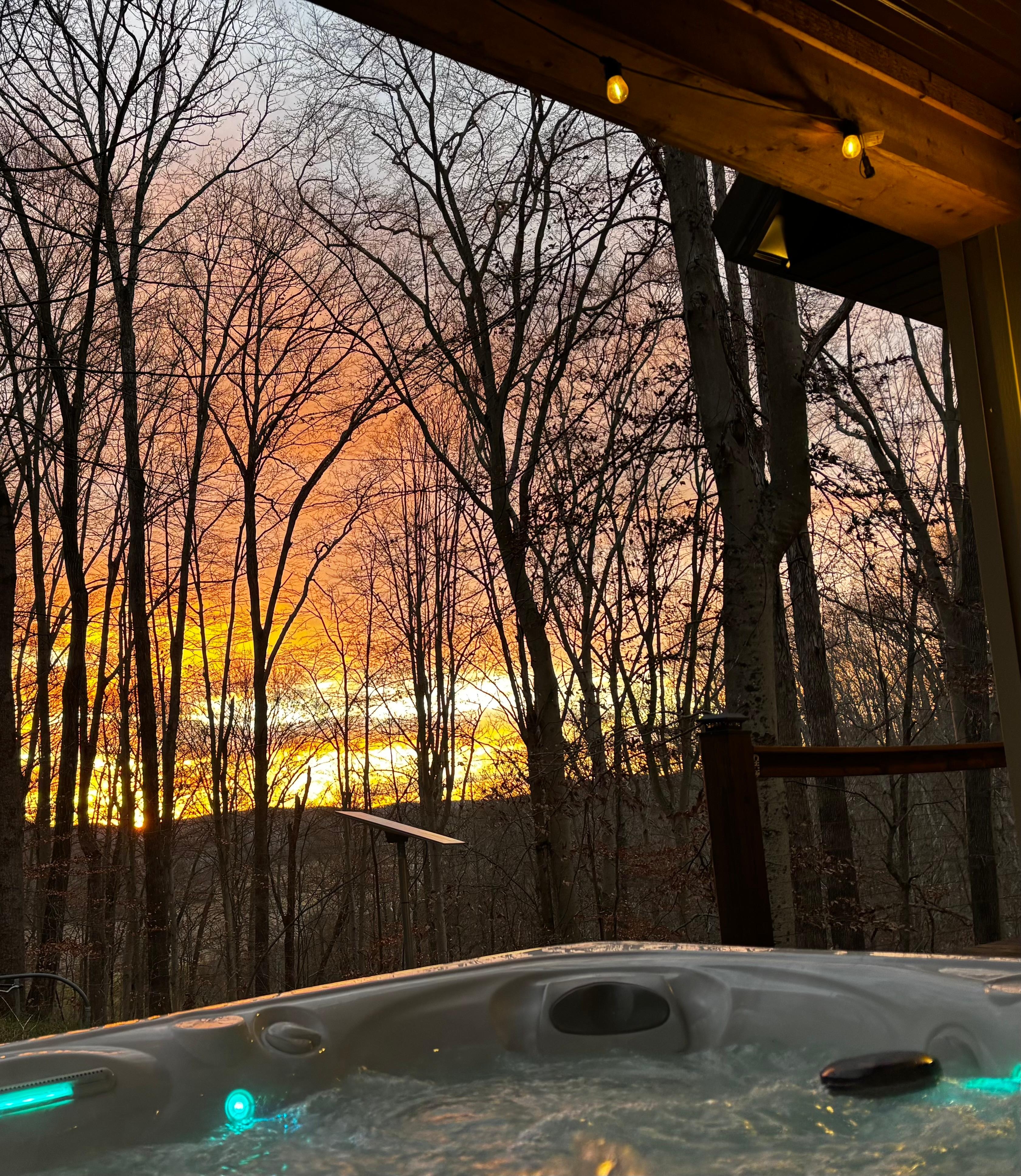 Hot tub & sunset view over the ridge