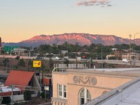 Sangre de Cristo mountains at sunset. From roof top bar