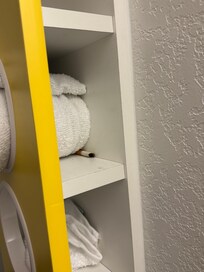 Half smoked cigarette on the towel rack