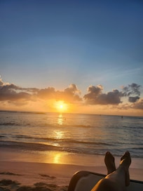 Me on the beach! They kept it clean of seaweed!