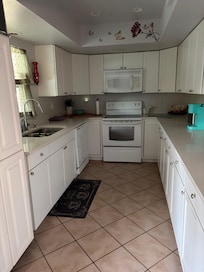 Functional kitchen but not enough pots