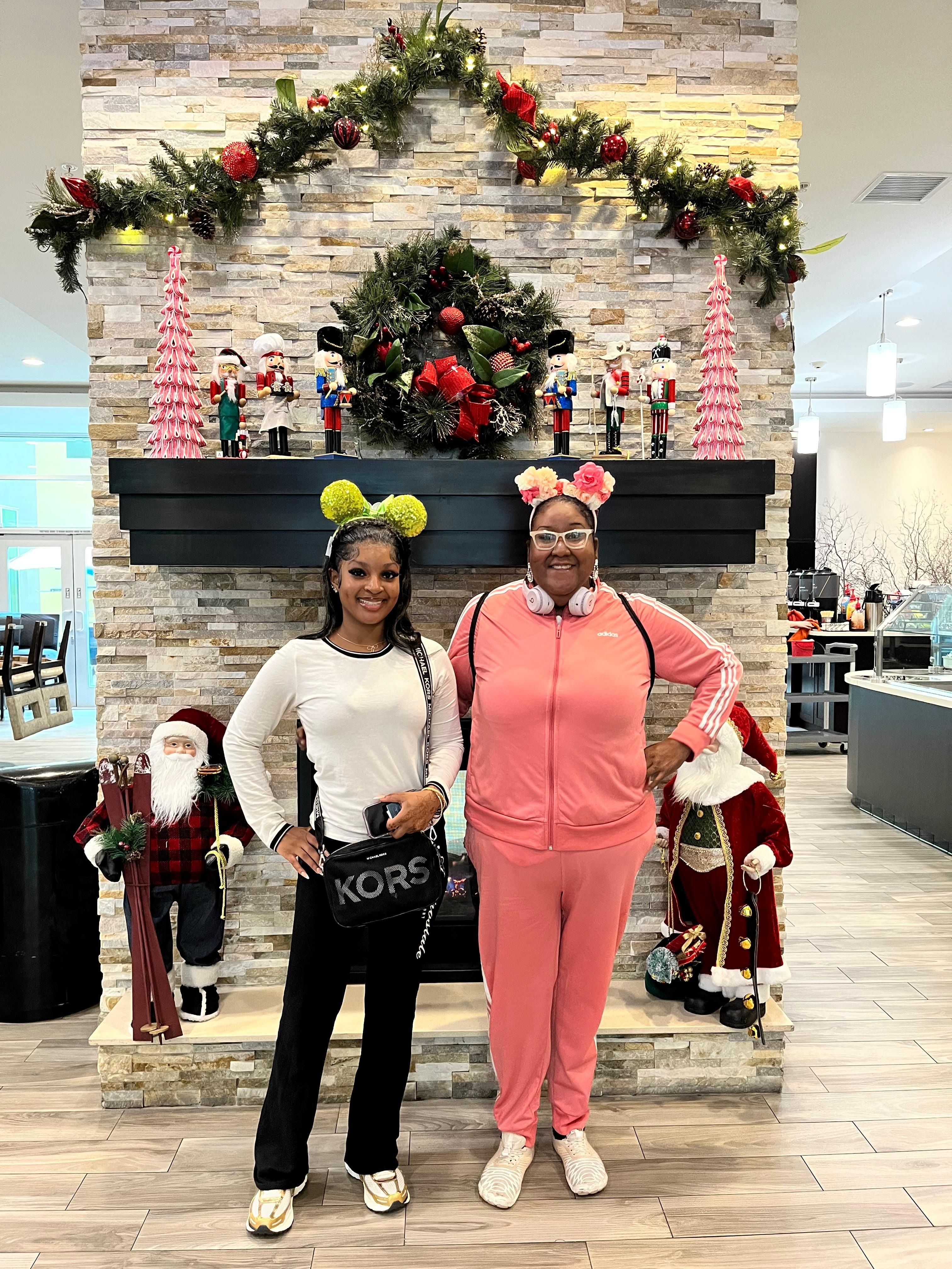 Front entryway Under the fireplace decorated for the Christmas season.