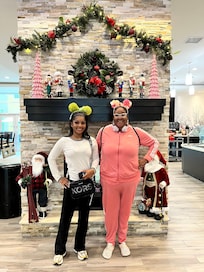 Front entryway Under the fireplace decorated for the Christmas season.