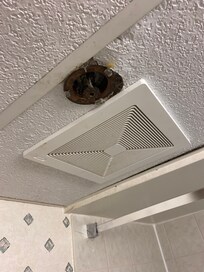 Corroded sprinkler head in the bathroom.