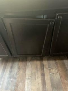 Hanging cabinet door in kitchen.