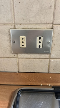 These electric outlets were thinner prongs than those available in Milan (with our universal converter)