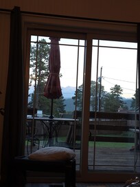 View of Pike's Peak from the living room. Enjoy coffee on the deck in the mornings.