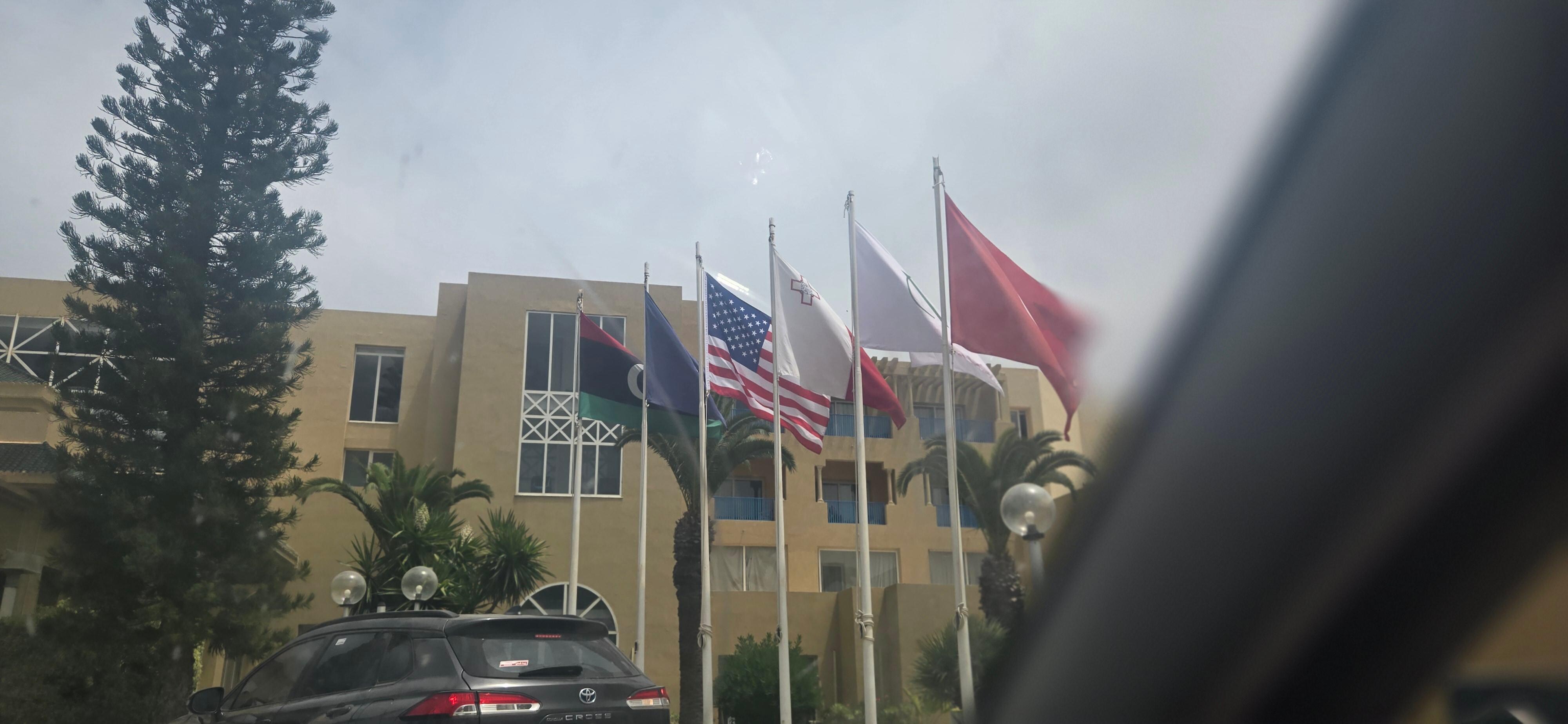 Front entrance showing the flags of different countries