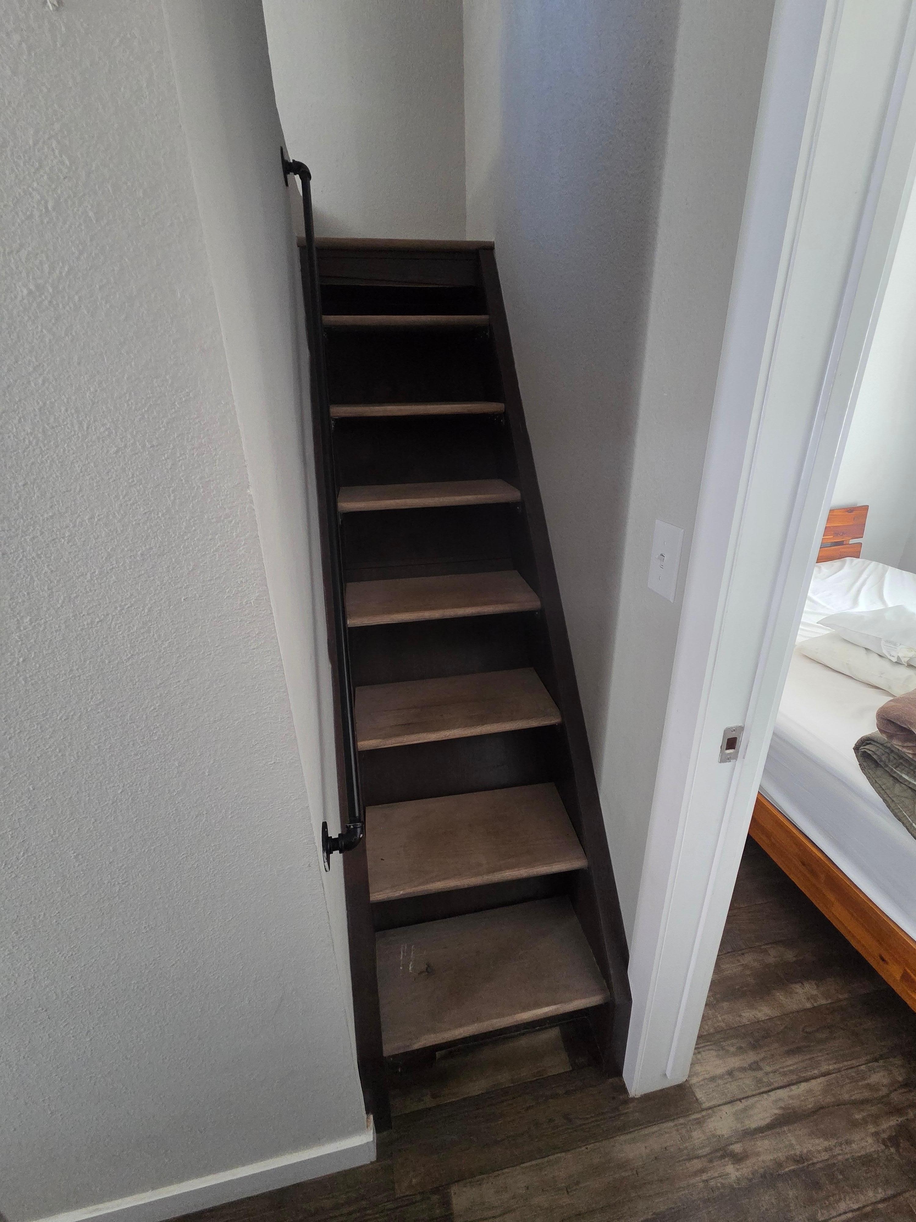 Stairs to the hideaway loft.