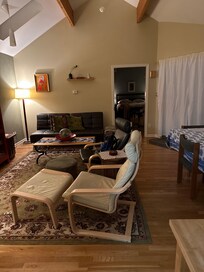 Living room looking towards private bedroom; sofa makes into a bed as well.