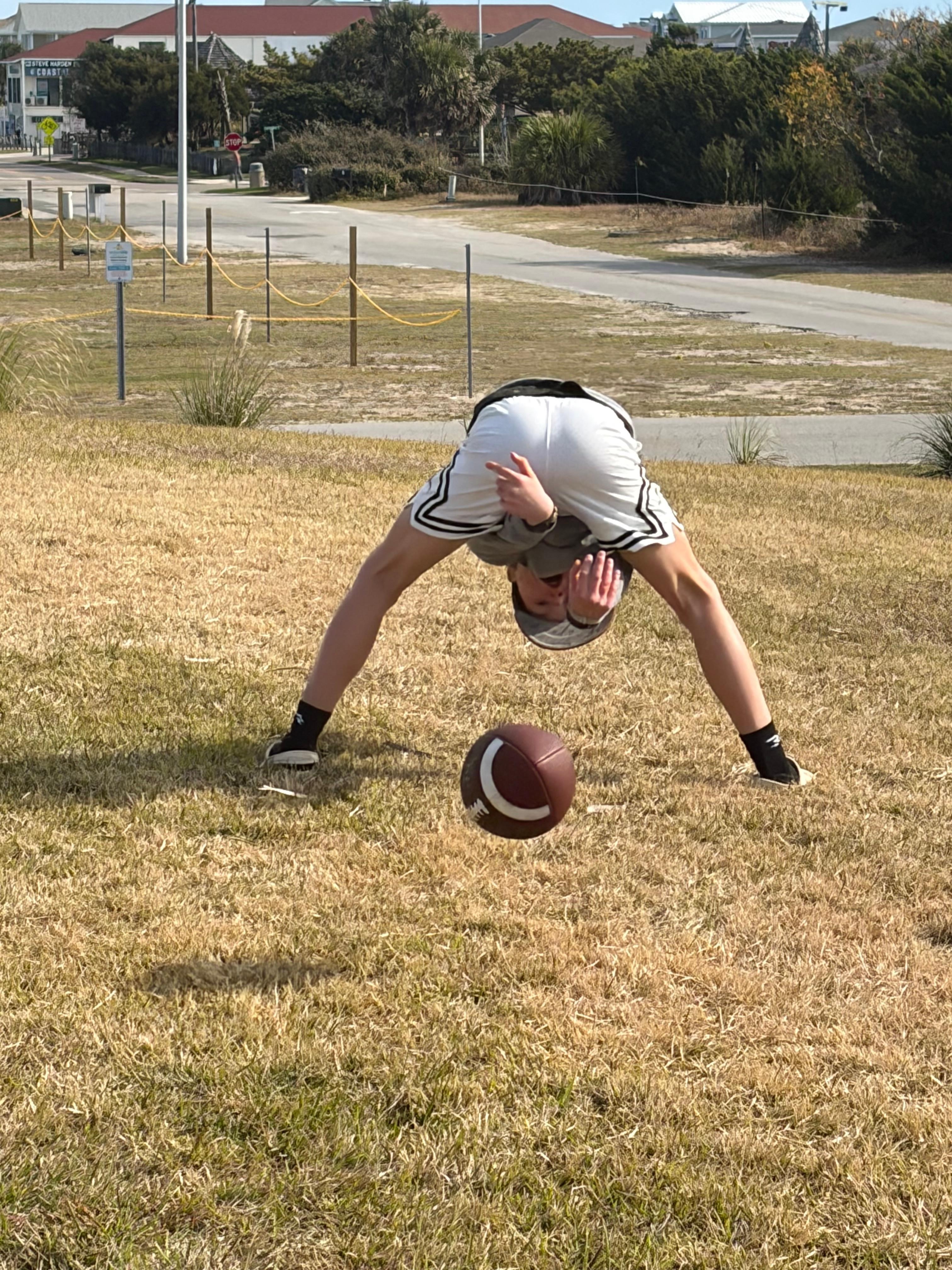 Football in the front  lawn. 