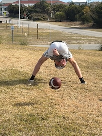 Football in the front lawn.