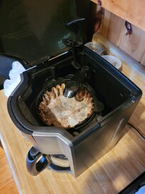 Moldy old coffee in coffee maker. Future guests, please do not use this coffee maker.