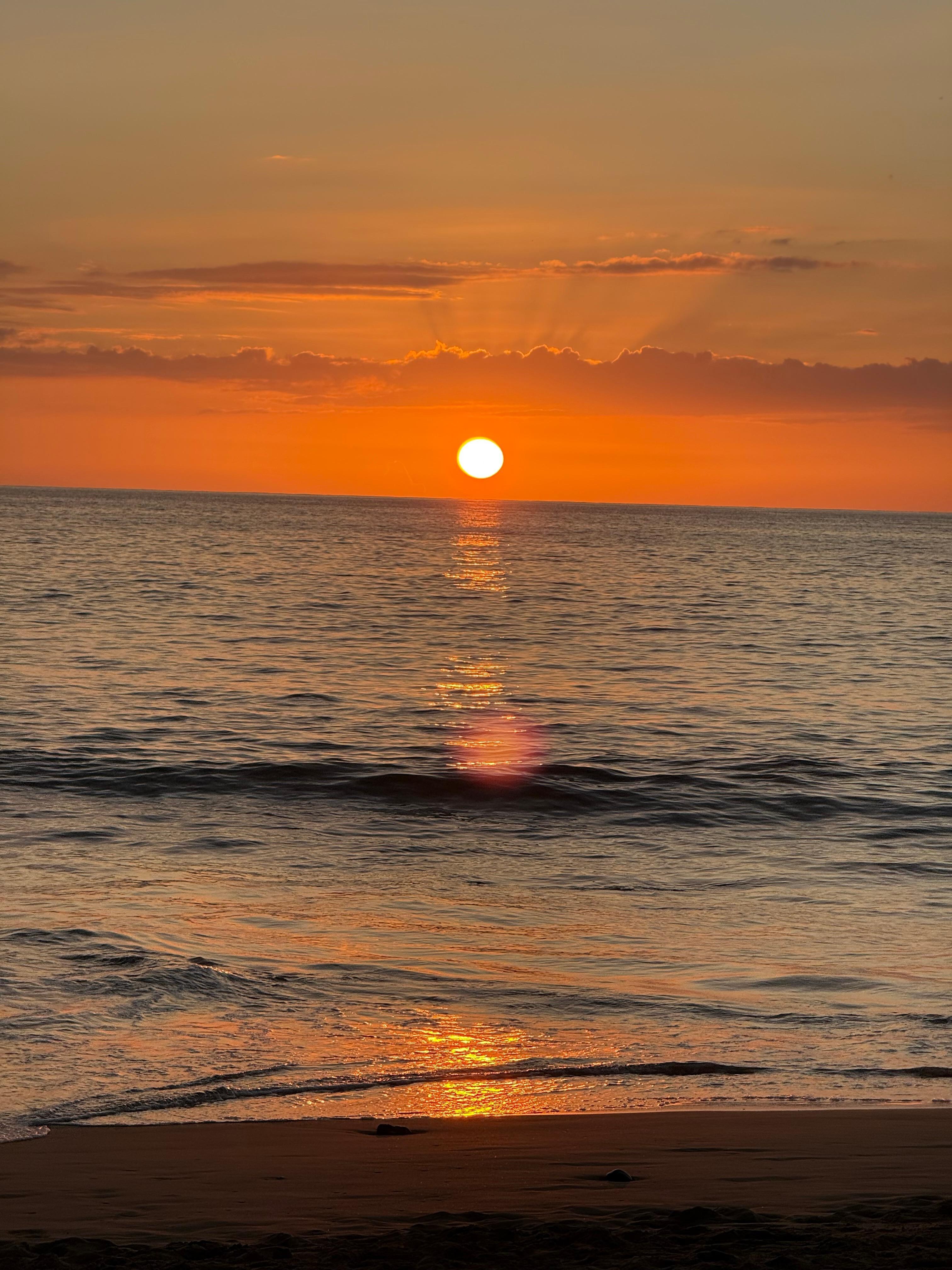 Beautiful sunsets at the beach below condo 