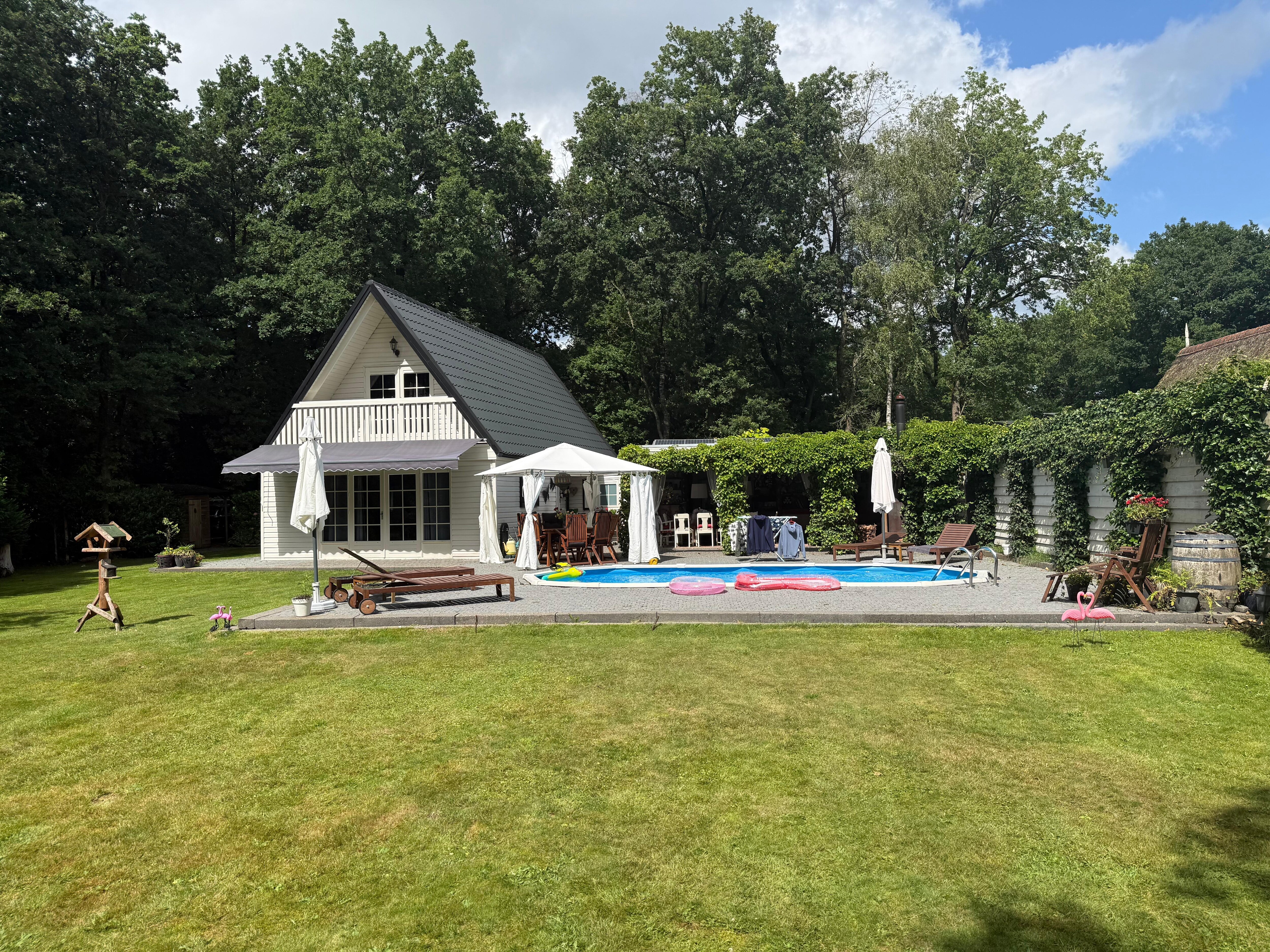 Exterior with terrace and pool area