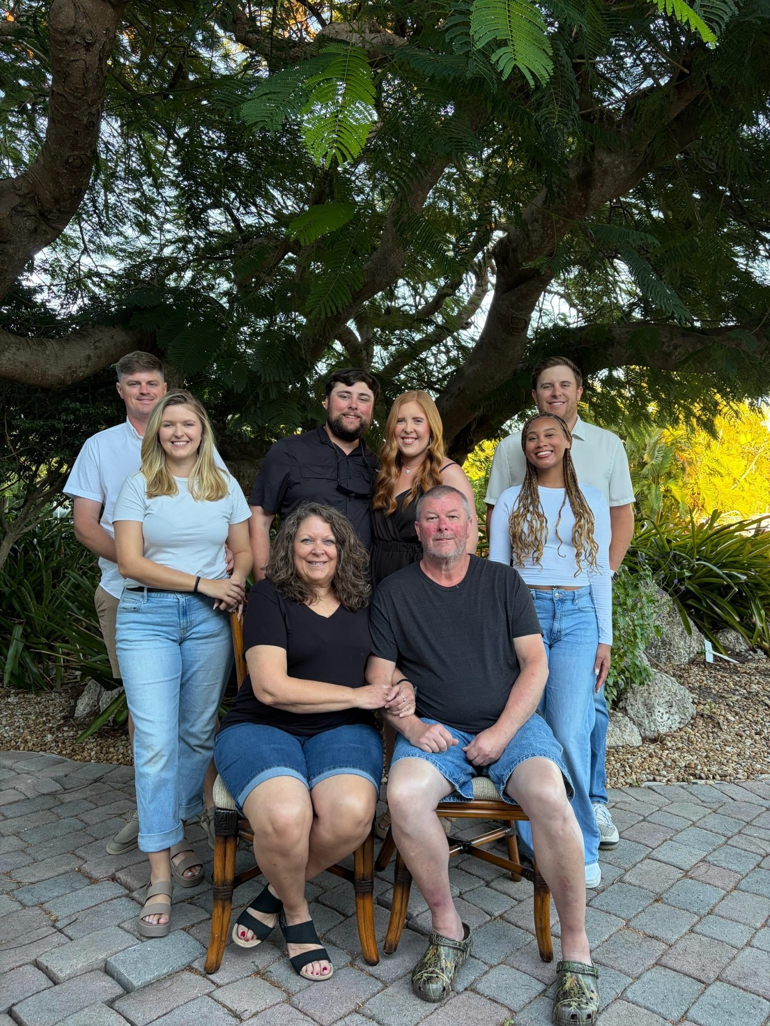 Out front, by the oldest tree on the island. 