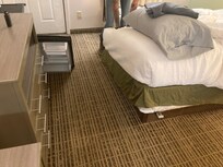 Hard to see- sit on one side, the whole back side flips up