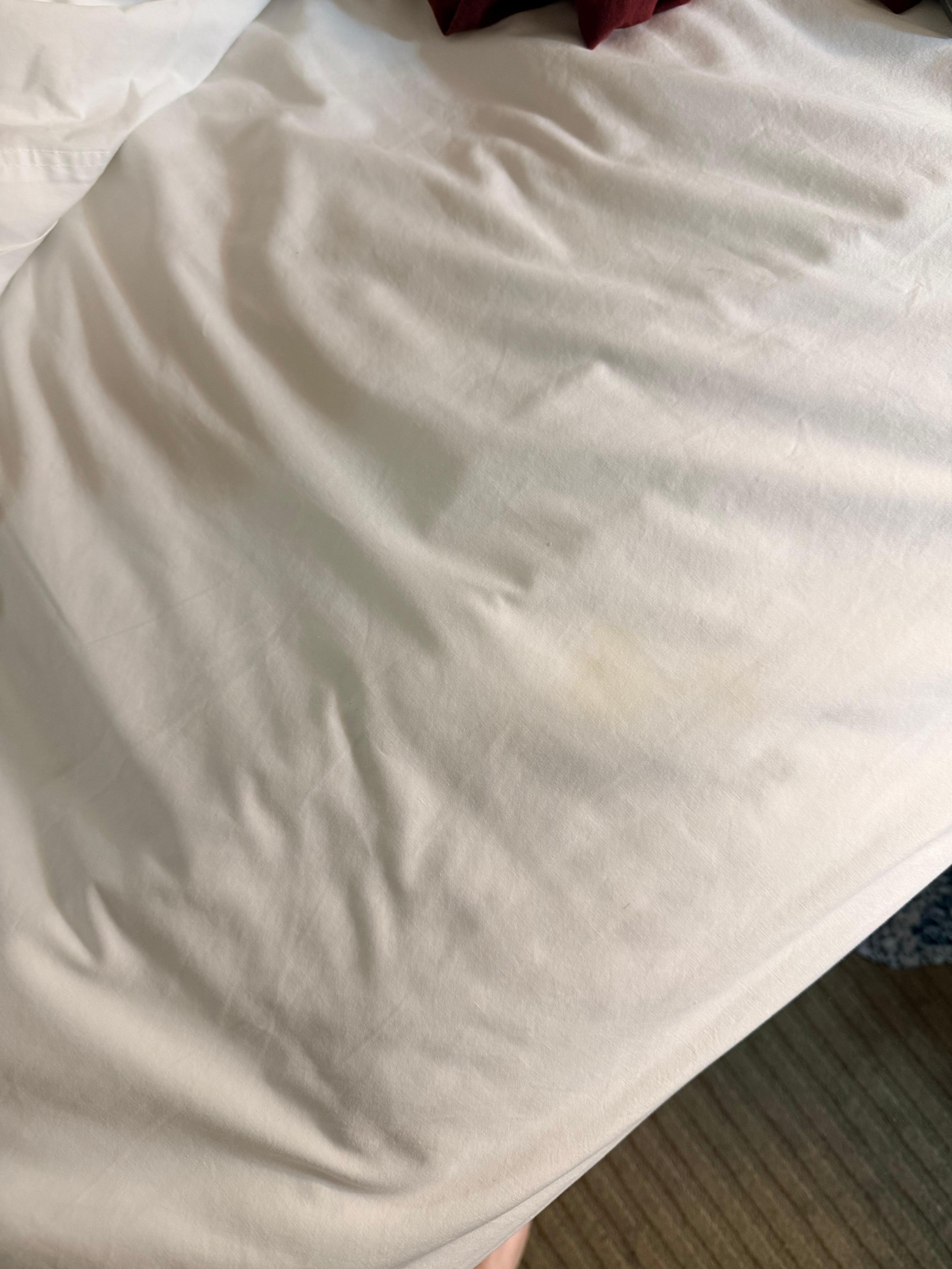 The bedding had yellow stains 
