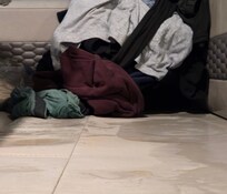 Soaked clothes from leaky ceiling.