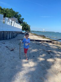 My little explorer on the sandy area of the beach