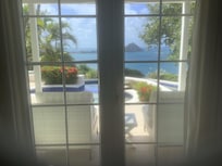 View from lower floor bedroom towards pool