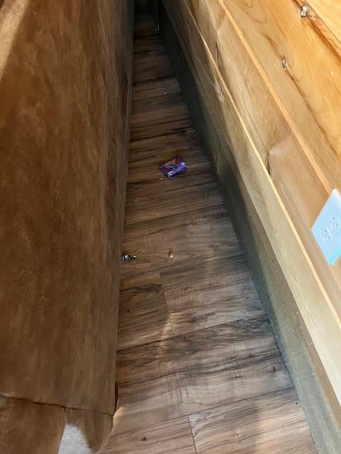 Moved the couch to look for hockey puck. Cleaners can easily pull furniture out.