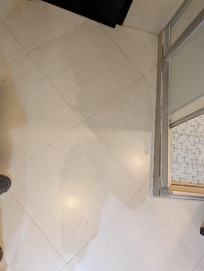 Water pooling from shower to the room