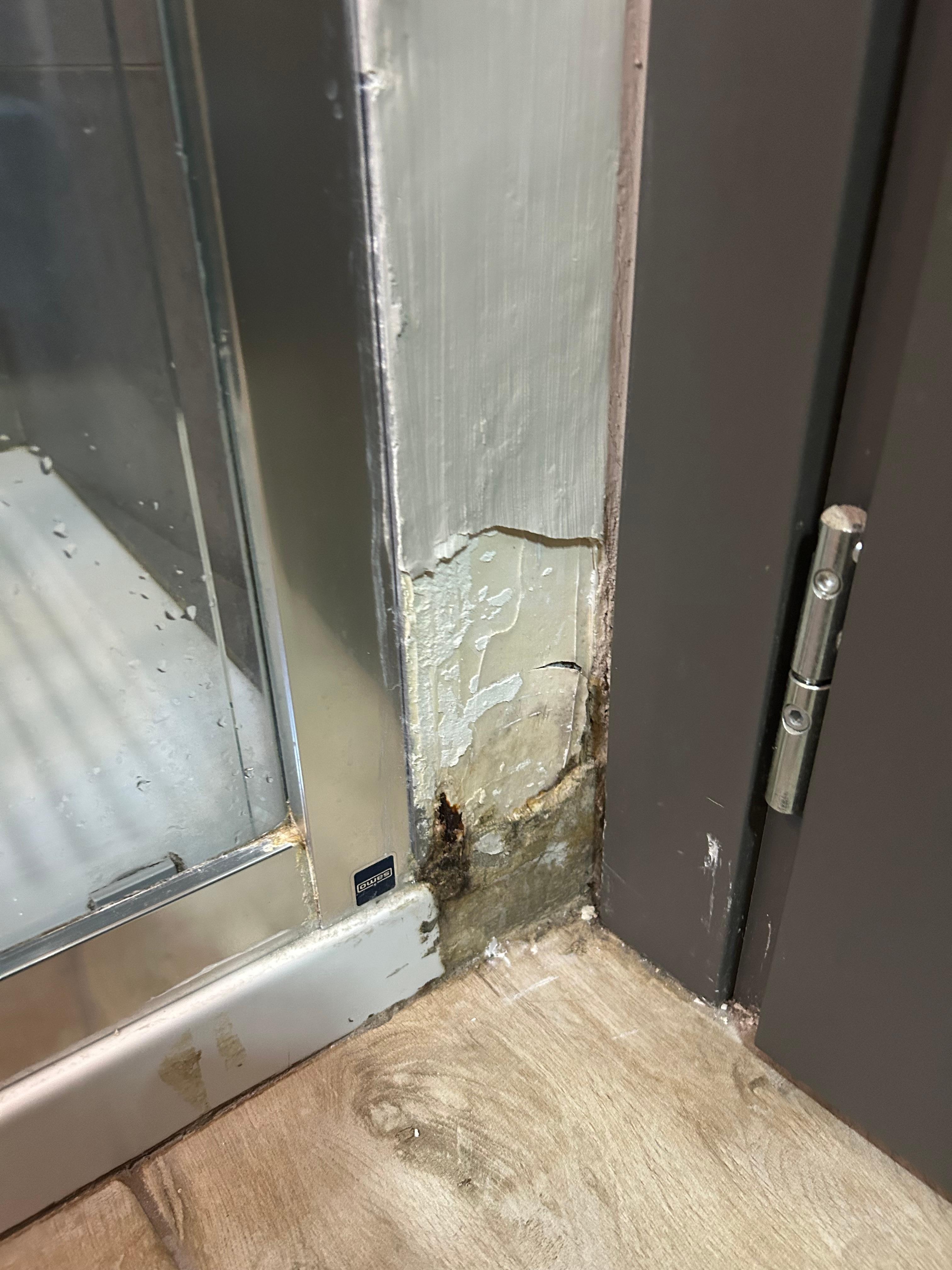 Internal wall in the bedroom- dirty, mouldy, damp and tired 