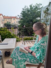 Sitting on the balcony with our friendly dove