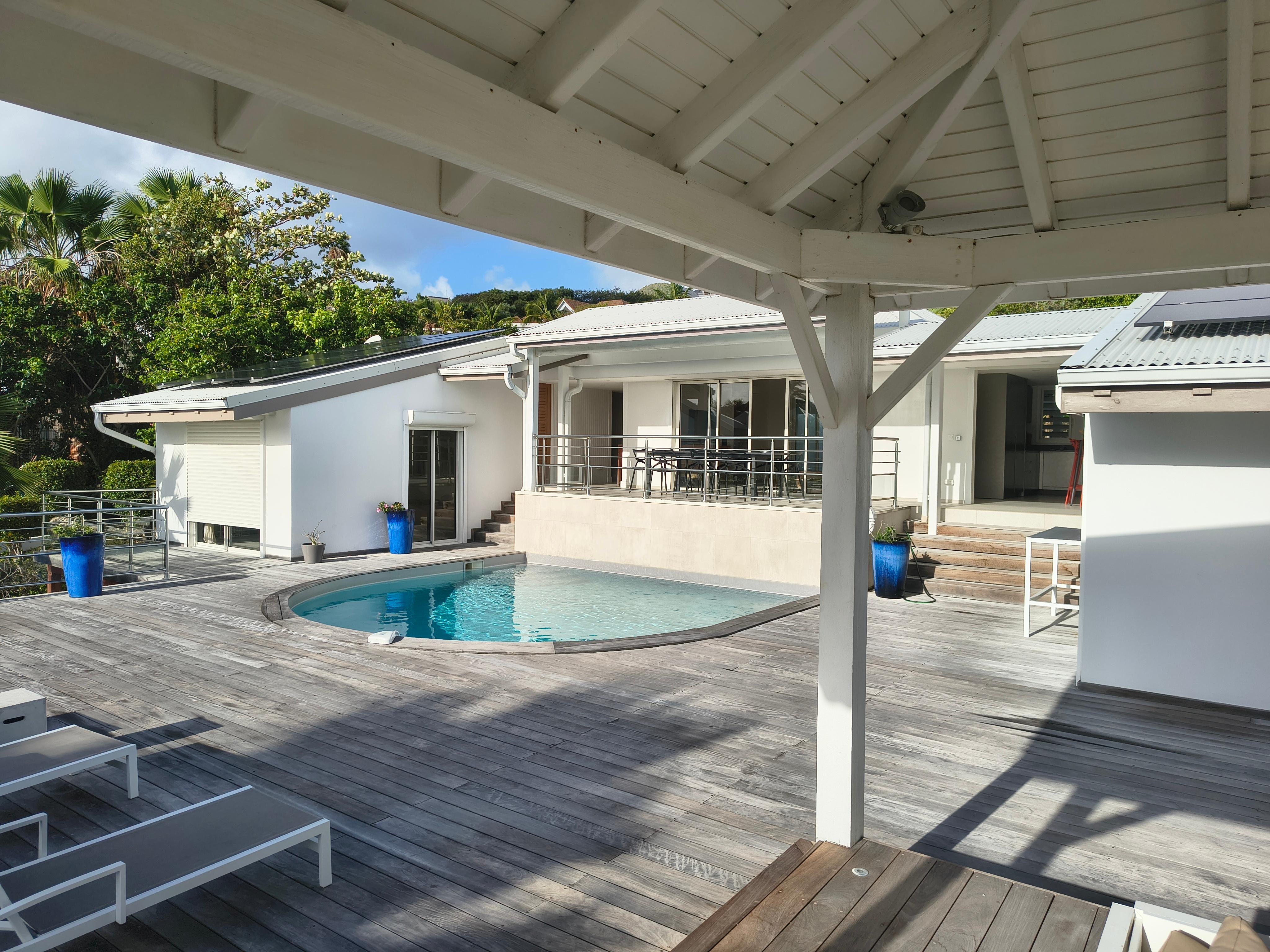 Pool  from covered sitting area.